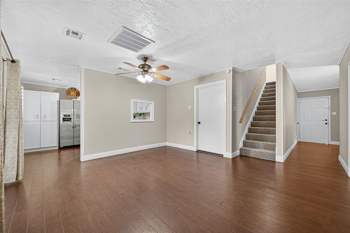 Empty room, Interior, Kitchen, Stainless Steel Appliances, Wood Texture Flooring