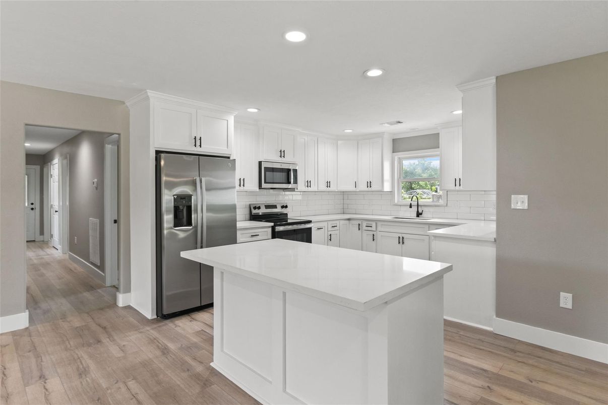Interior, Kitchen, Recessed Lighting, Stainless Steel Appliances, Wood Texture Flooring