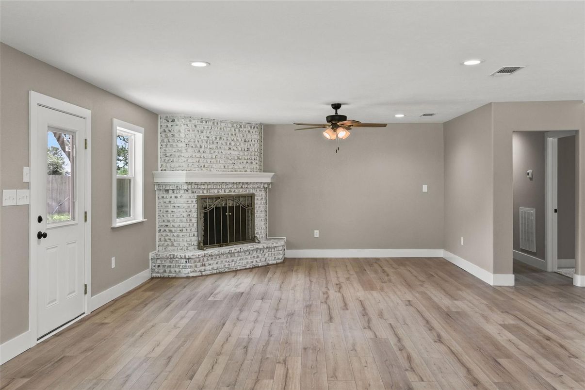 Empty room, Fireplace, Interior, Recessed Lighting, Wood Texture Flooring
