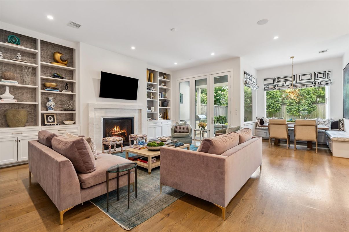 Dining room, Fireplace, Interior, Living room, Pendant Lights, Recessed Lighting, Wood Texture Flooring