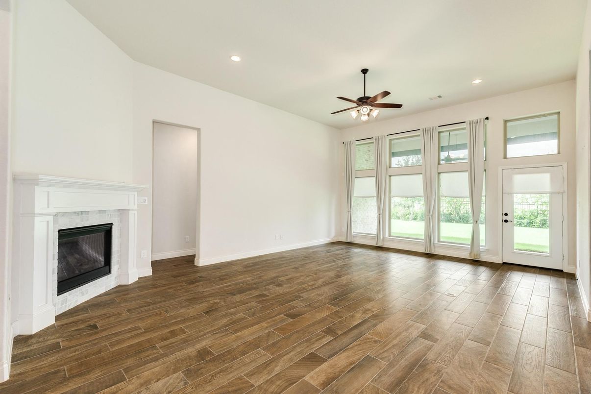 Empty room, Fireplace, Interior, Recessed Lighting, Wood Texture Flooring