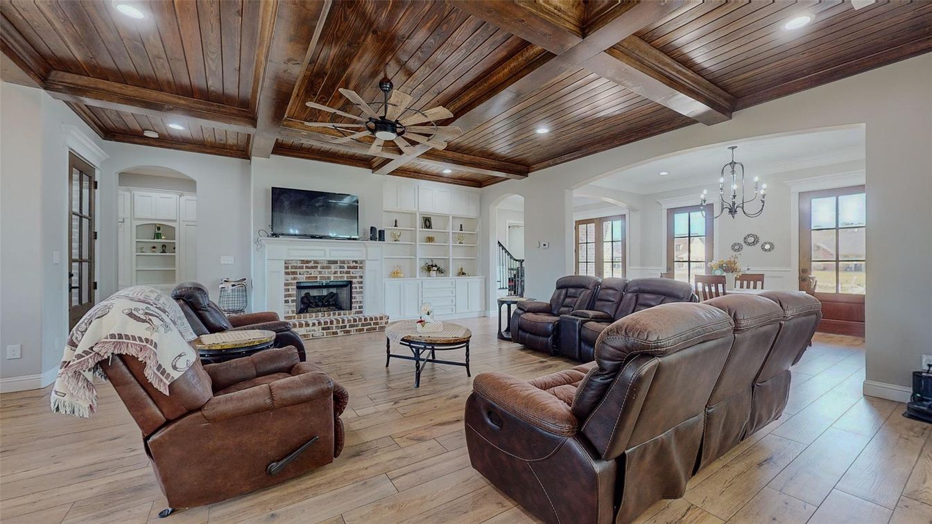Chandelier, Fireplace, Interior, Living room, Recessed Lighting, Wooden Beams, Wooden Ceilings, Wood Texture Flooring