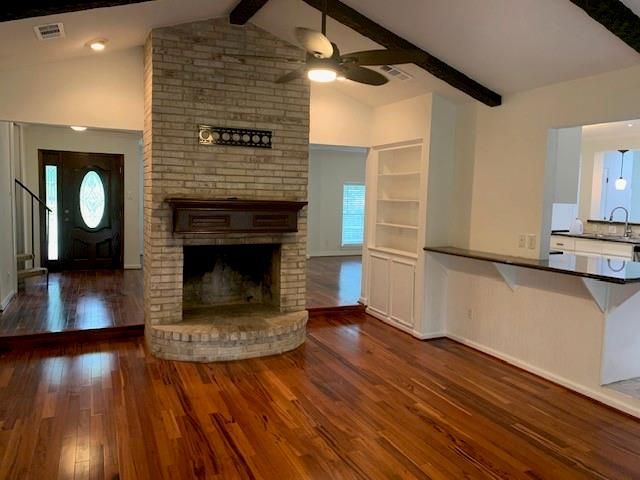 Empty room, Fireplace, Interior, Recessed Lighting, Stone Walls, Wooden Beams, Wood Texture Flooring