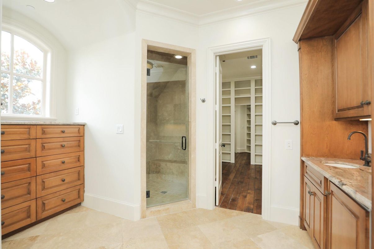 Bathroom, Glass Shower, Interior, Recessed Lighting, Walk-in Closets, Wood Texture Flooring