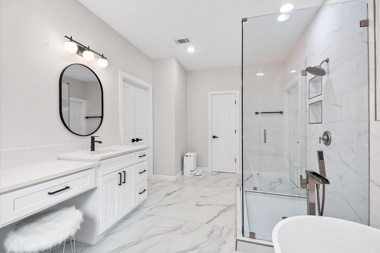 Bathroom, Dual Sink Vanities, Glass Shower, Interior, Marble, Marble Walls, Recessed Lighting