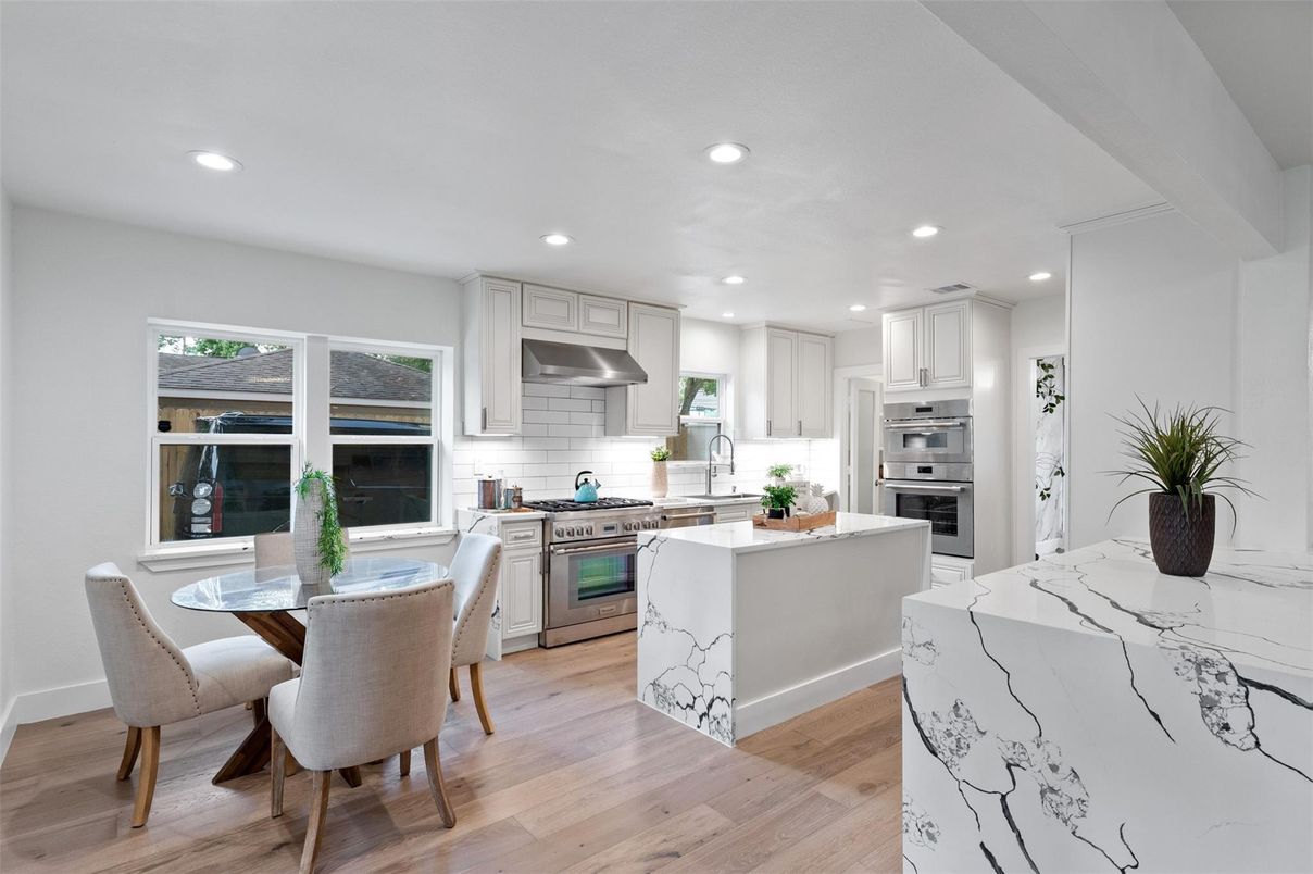 Dining room, Interior, Kitchen, Recessed Lighting, Stainless Steel Appliances, Wood Texture Flooring
