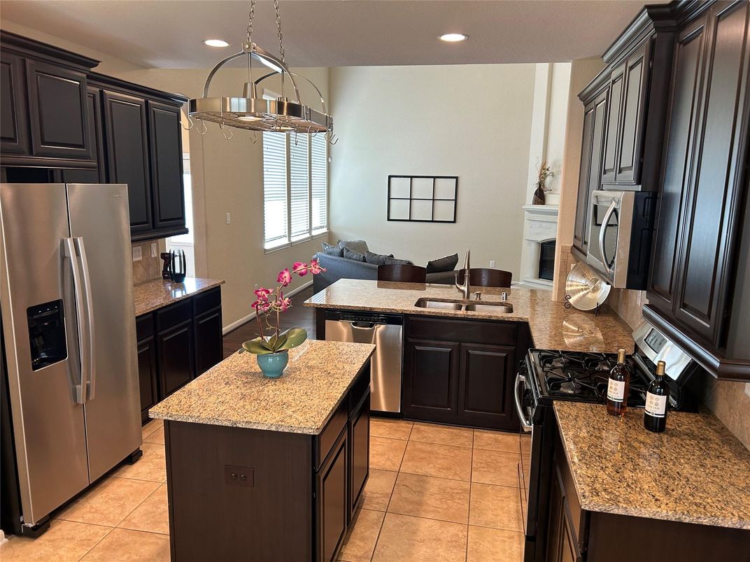 Fireplace, Interior, Kitchen, Pendant Lights, Recessed Lighting, Stainless Steel Appliances