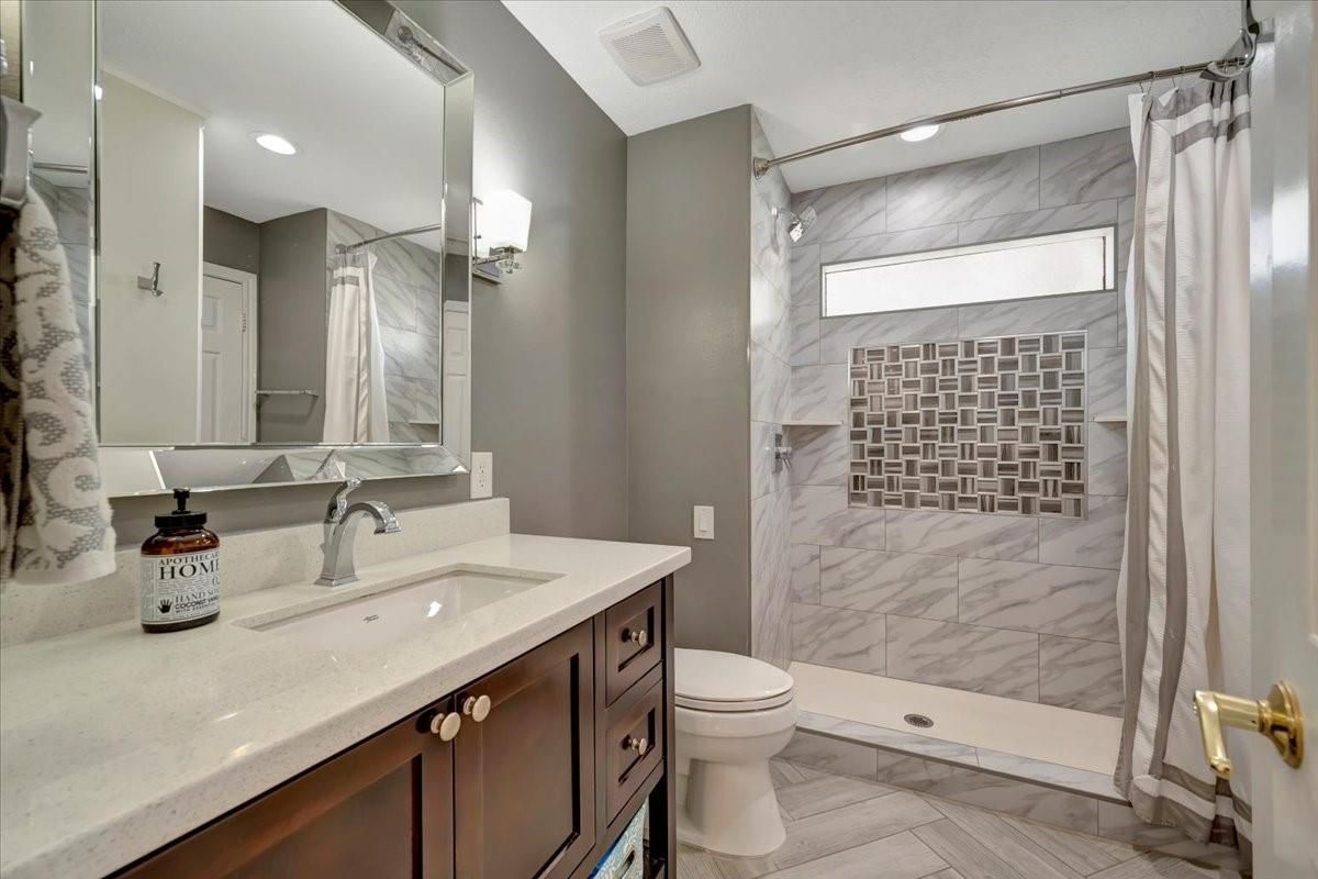 Bathroom, Interior, Marble Walls, Recessed Lighting, Wood Texture Flooring