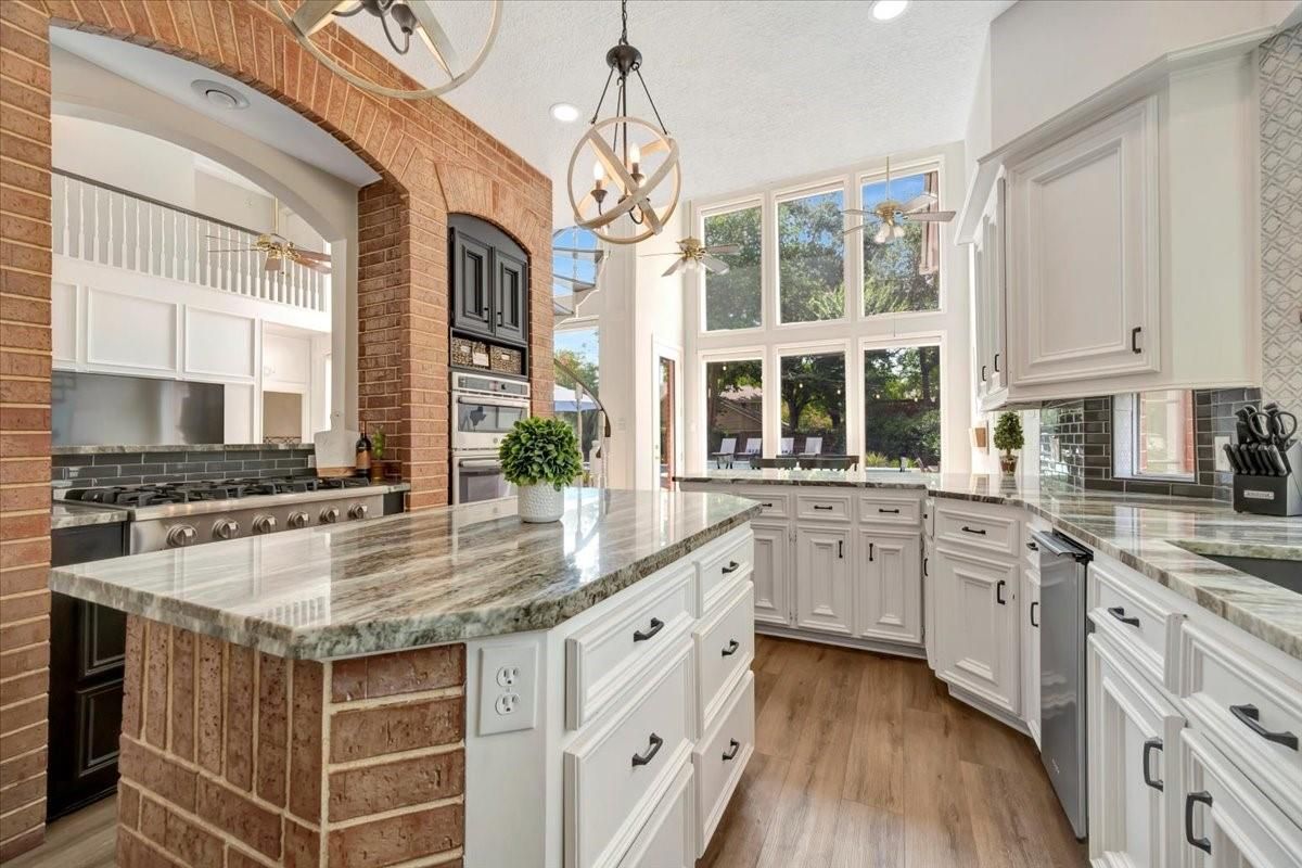 Chandelier, Interior, Kitchen, Pendant Lights, Recessed Lighting, Stainless Steel Appliances, Wood Texture Flooring