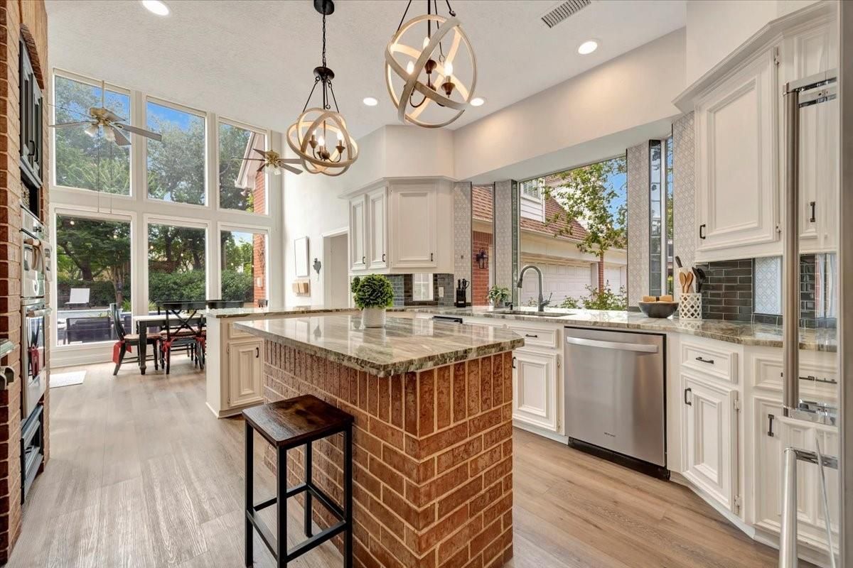 Dining room, Interior, Kitchen, Pendant Lights, Recessed Lighting, Stainless Steel Appliances, Wood Texture Flooring