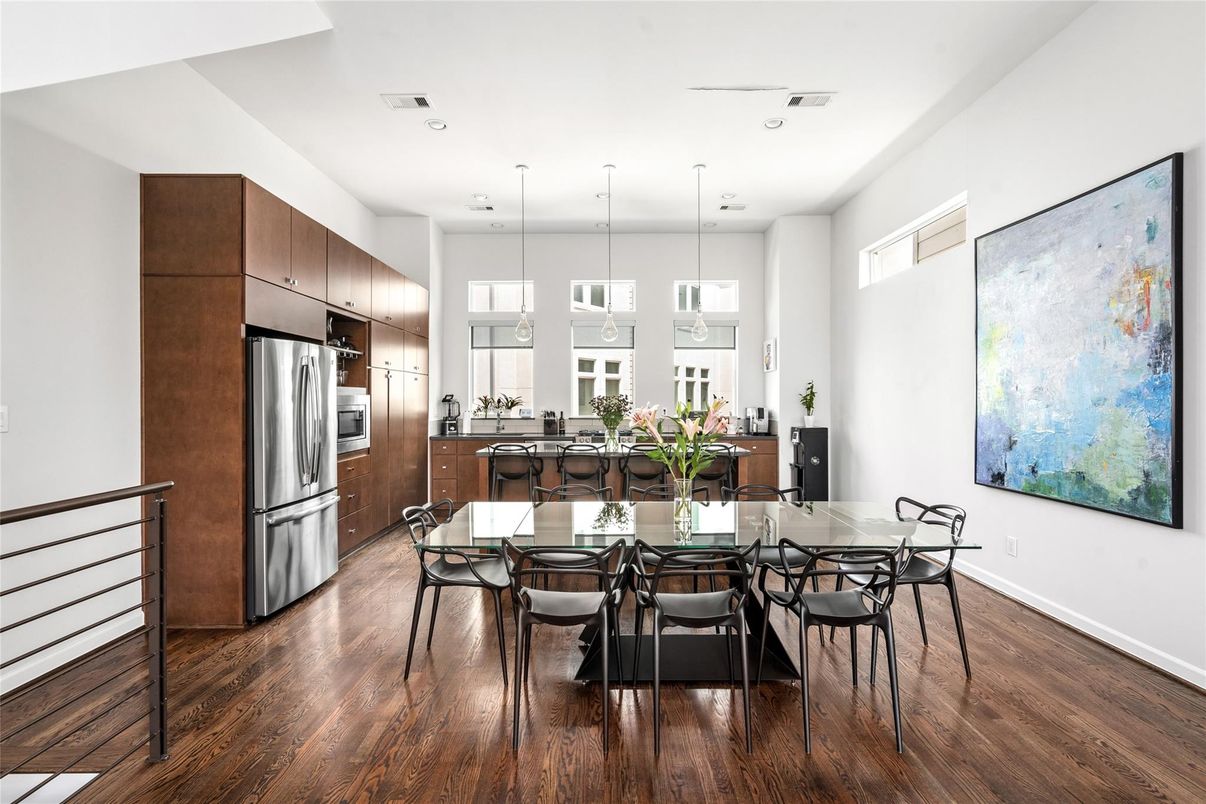 Dining room, Interior, Kitchen, Pendant Lights, Recessed Lighting, Stainless Steel Appliances, Wood Texture Flooring
