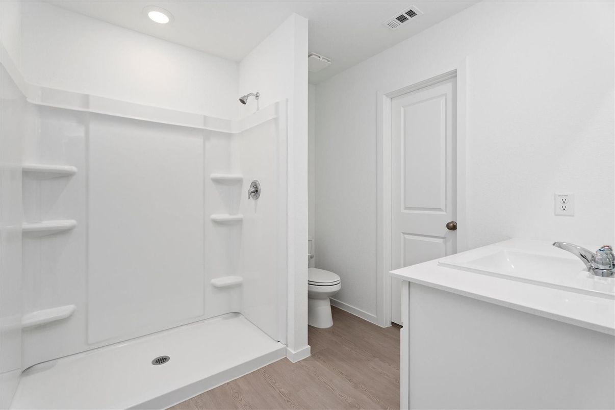 Bathroom, Dual Sink Vanities, Interior, Recessed Lighting, Wood Texture Flooring