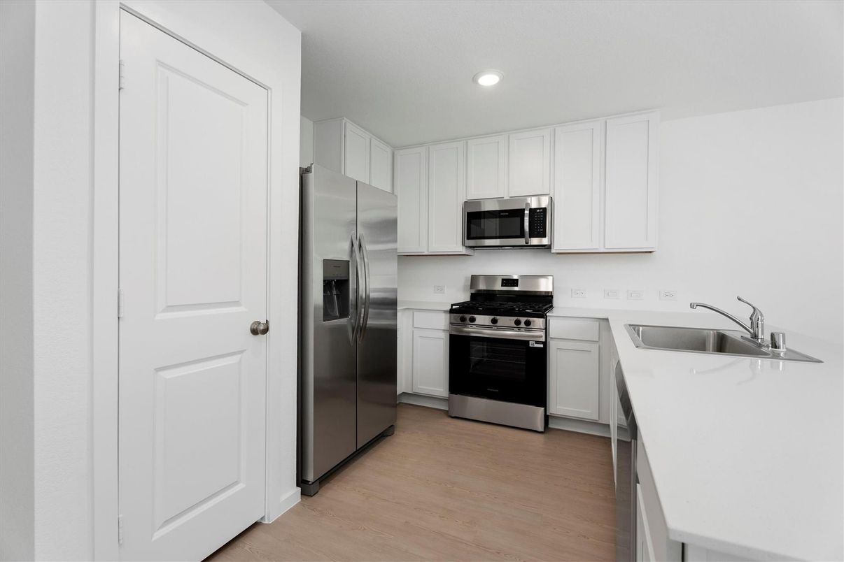Interior, Kitchen, Recessed Lighting, Stainless Steel Appliances, Wood Texture Flooring