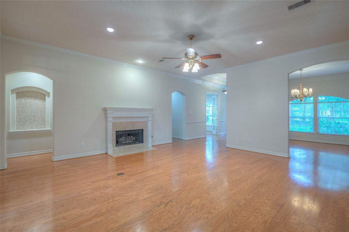 Chandelier, Empty room, Fireplace, Interior, Recessed Lighting, Wood Texture Flooring