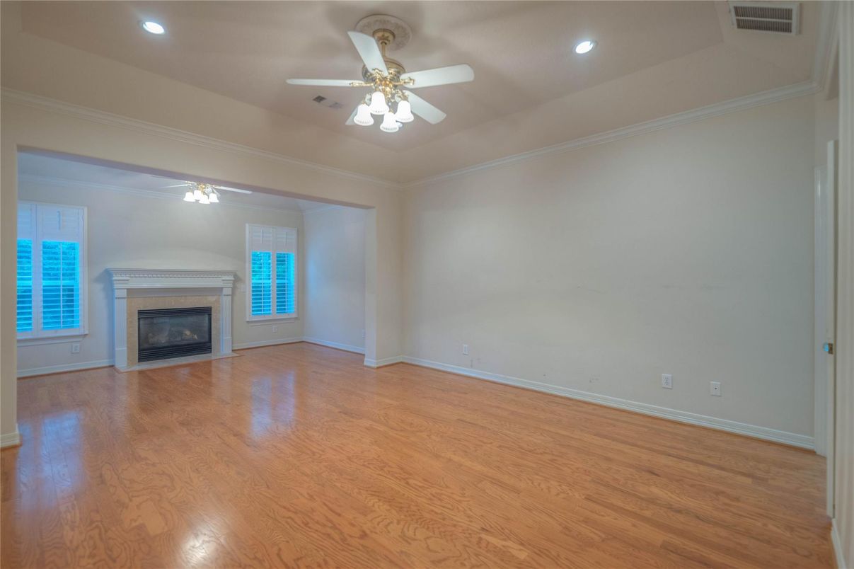 Empty room, Fireplace, Interior, Recessed Lighting, Wood Texture Flooring
