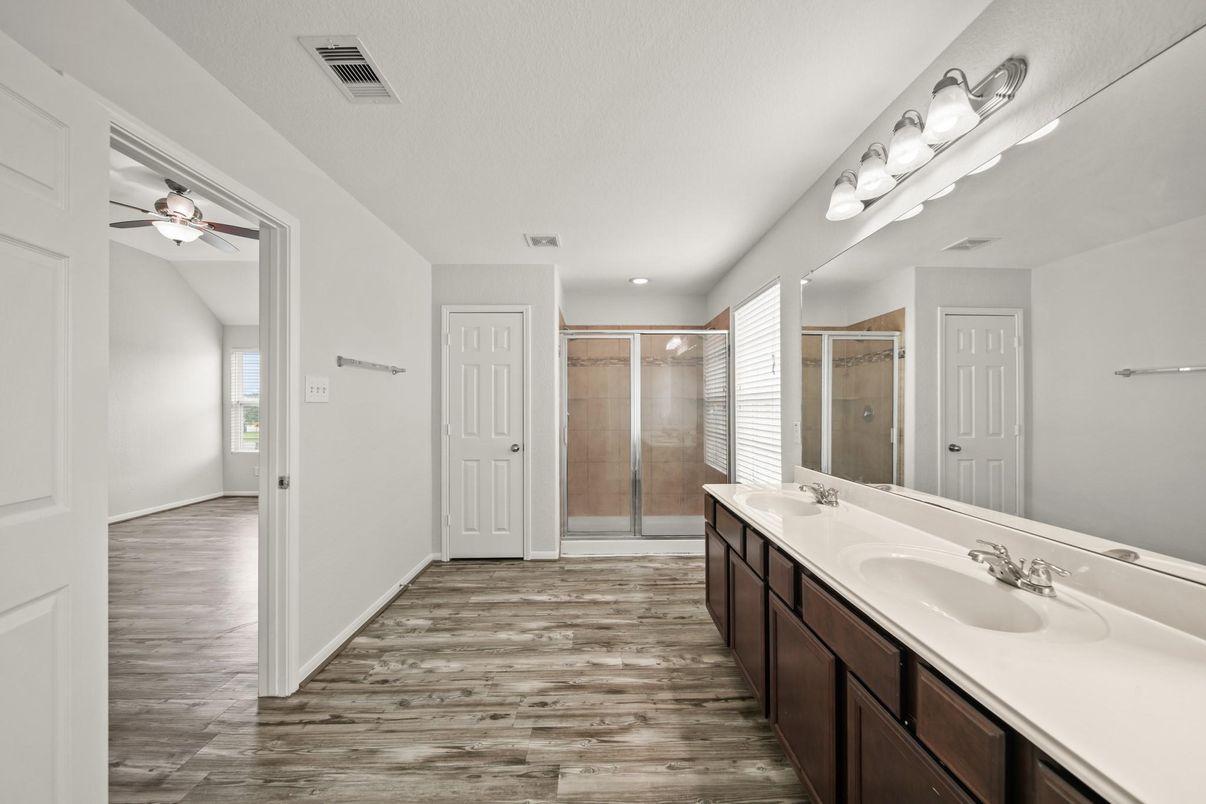Bathroom, Dual Sink Vanities, Glass Shower, Interior, Wood Texture Flooring