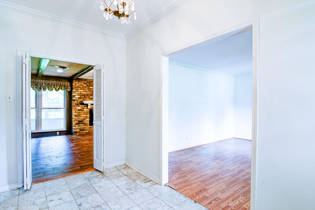 Chandelier, Empty room, Interior, Stone Walls, Wine Storage, Wood Texture Flooring