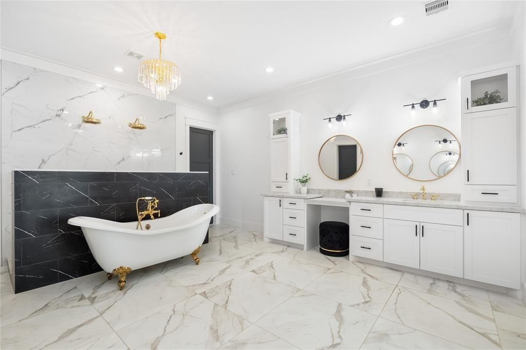 Bathroom, Chandelier, Dual Sink Vanities, Free Standing Baths, Interior, Marble, Marble Walls, Recessed Lighting