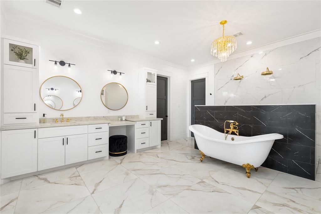 Bathroom, Chandelier, Dual Sink Vanities, Free Standing Baths, Interior, Marble, Marble Walls, Recessed Lighting