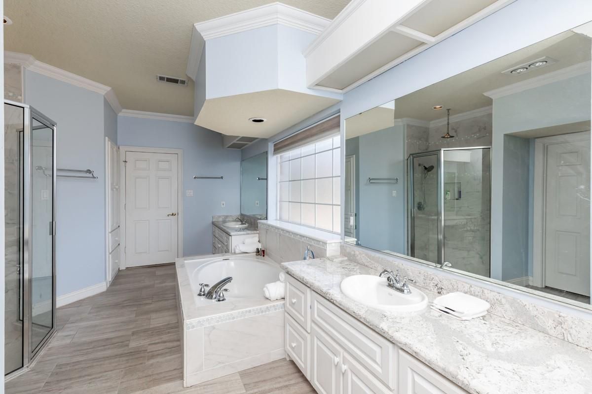 Bathroom, Dual Sink Vanities, Glass Shower, Interior, Recessed Lighting, Wood Texture Flooring