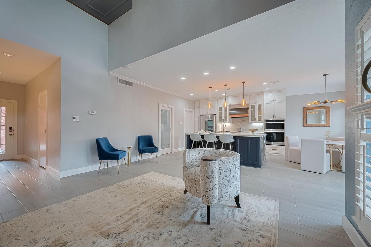 Dining room, Interior, Kitchen, Pendant Lights, Recessed Lighting, Stainless Steel Appliances, Wood Texture Flooring