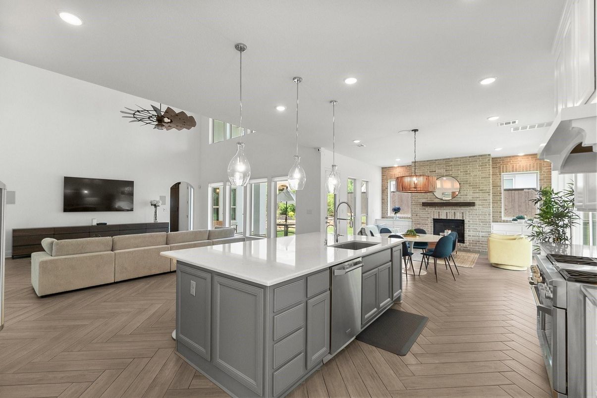 Dining room, Fireplace, Interior, Kitchen, Living room, Pendant Lights, Recessed Lighting, Stainless Steel Appliances, Stone Walls, Wood Texture Flooring
