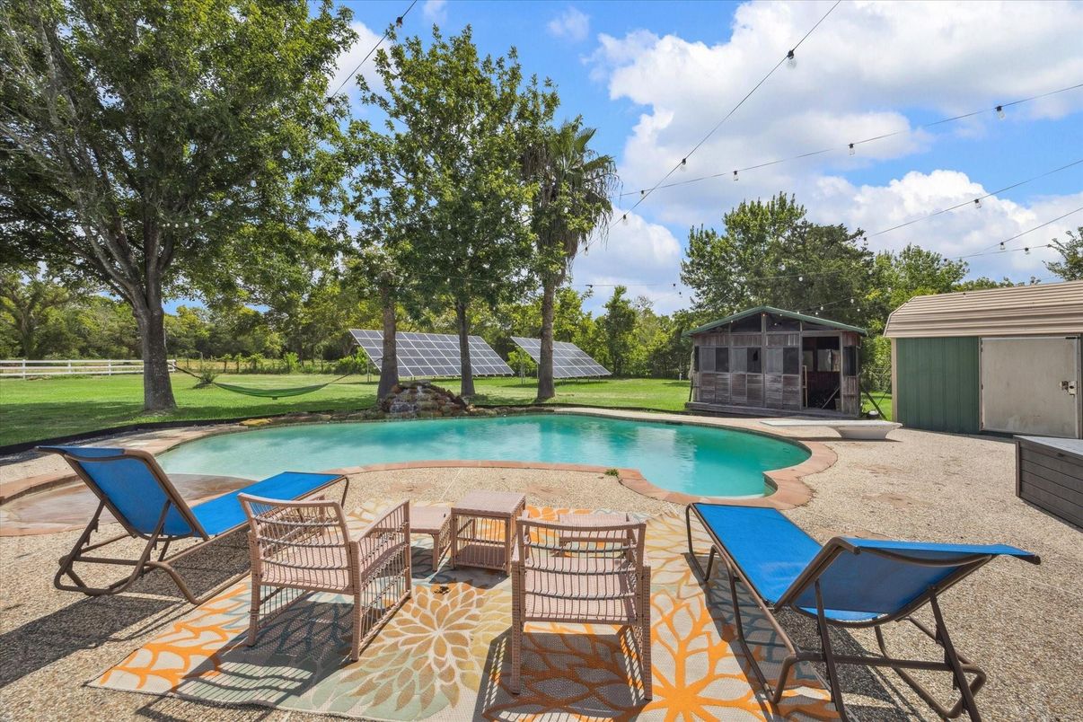 Exterior, Pool, Solar Panels