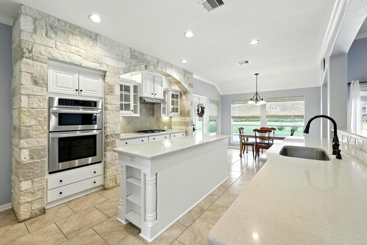 Dining room, Interior, Kitchen, Pendant Lights, Recessed Lighting, Stainless Steel Appliances, Stone Walls