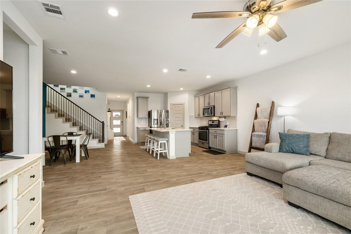 Dining room, Interior, Kitchen, Living room, Recessed Lighting, Stainless Steel Appliances, Wood Texture Flooring