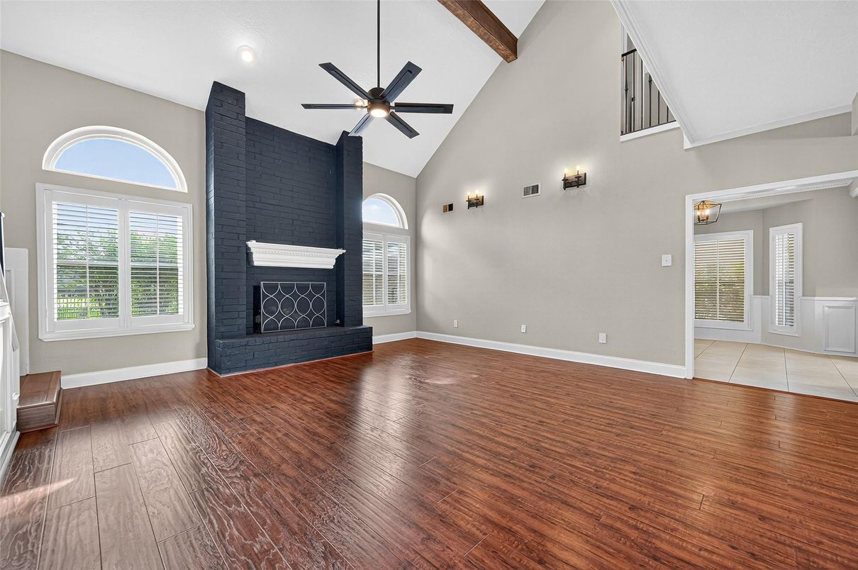 Empty room, Fireplace, Interior, Recessed Lighting, Wooden Beams, Wood Texture Flooring