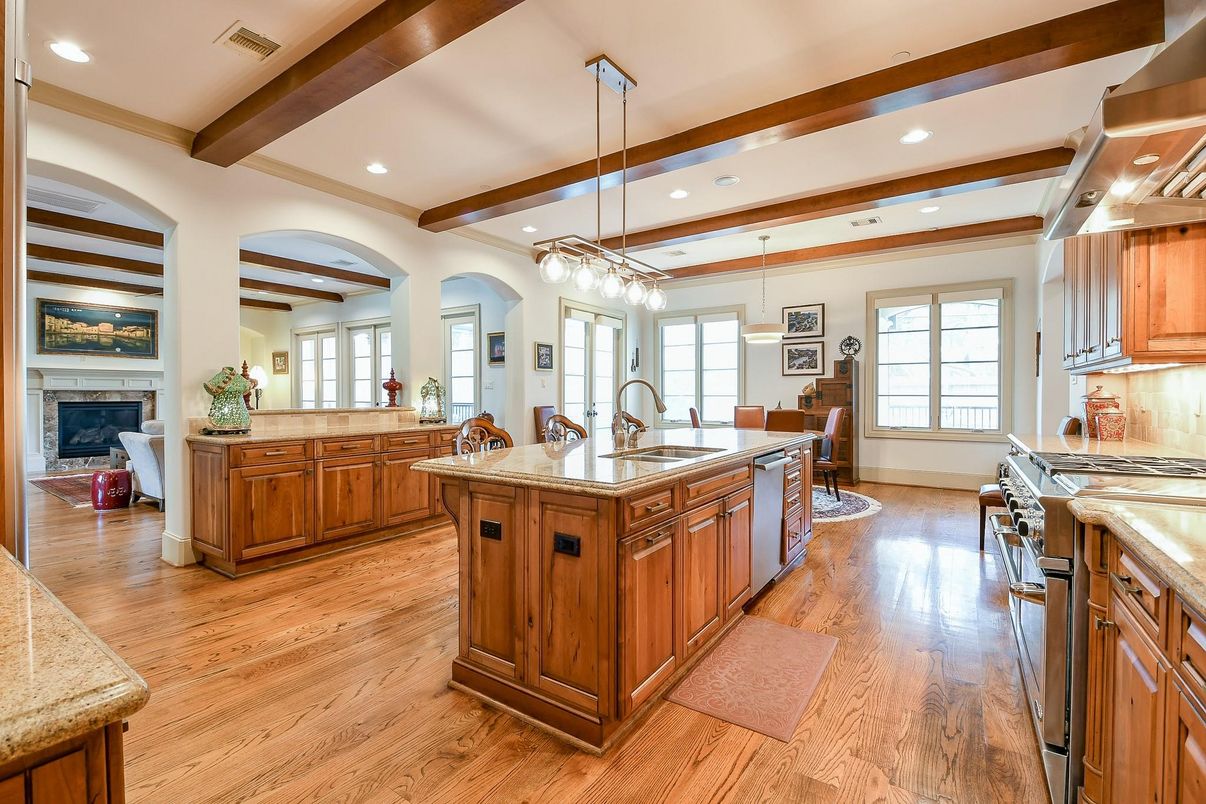 Chandelier, Fireplace, Interior, Kitchen, Pendant Lights, Recessed Lighting, Wooden Beams, Wood Texture Flooring