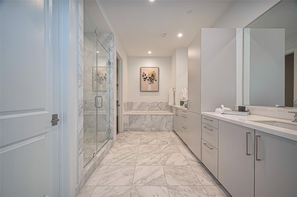 Bathroom, Dual Sink Vanities, Glass Shower, Interior, Marble, Marble Walls, Recessed Lighting