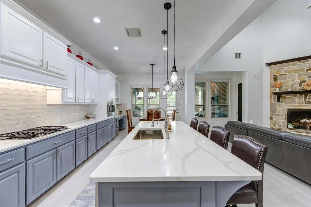 Dining room, Fireplace, Interior, Kitchen, Living room, Pendant Lights, Recessed Lighting, Stone Walls, Wood Texture Flooring