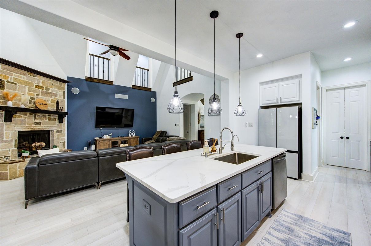 Fireplace, Interior, Kitchen, Living room, Pendant Lights, Recessed Lighting, Stone Walls, Wood Texture Flooring