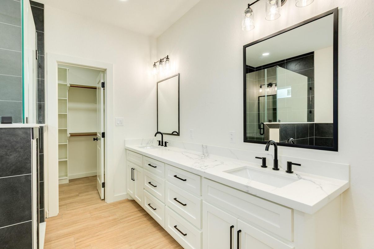 Bathroom, Dual Sink Vanities, Interior, Recessed Lighting, Walk-in Closets, Wood Texture Flooring