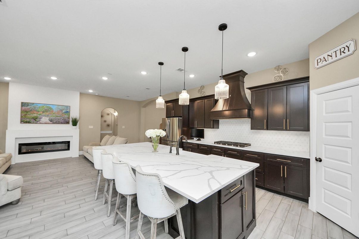 Fireplace, Interior, Kitchen, Pendant Lights, Recessed Lighting, Stainless Steel Appliances, Wood Texture Flooring