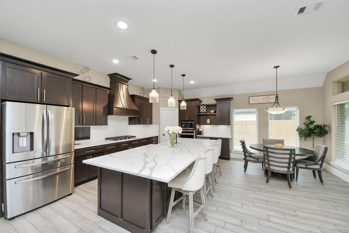 Dining room, Interior, Kitchen, Pendant Lights, Recessed Lighting, Stainless Steel Appliances, Wood Texture Flooring