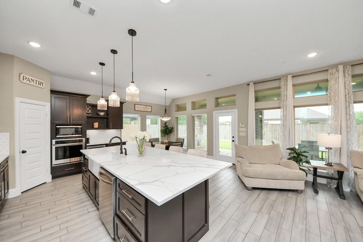 Dining room, Interior, Kitchen, Living room, Pendant Lights, Recessed Lighting, Stainless Steel Appliances, Wood Texture Flooring