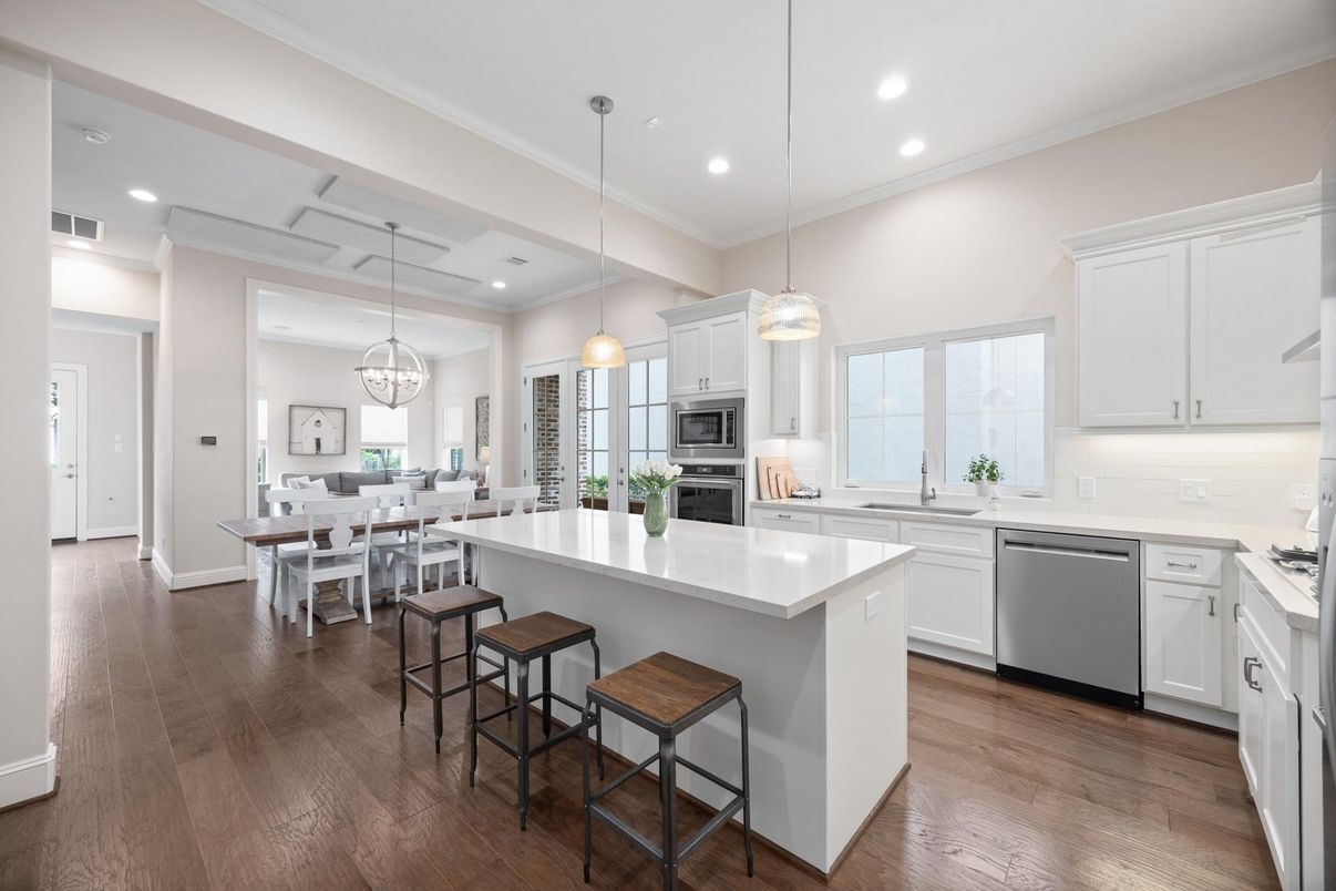 Dining room, Interior, Kitchen, Pendant Lights, Recessed Lighting, Stainless Steel Appliances, Wood Texture Flooring