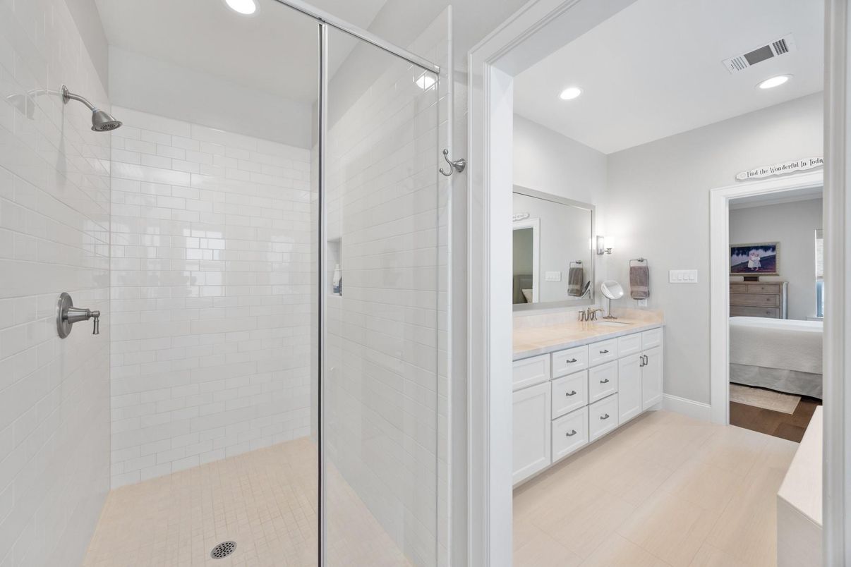Bathroom, Dual Sink Vanities, Glass Shower, Interior, Recessed Lighting, Wood Texture Flooring