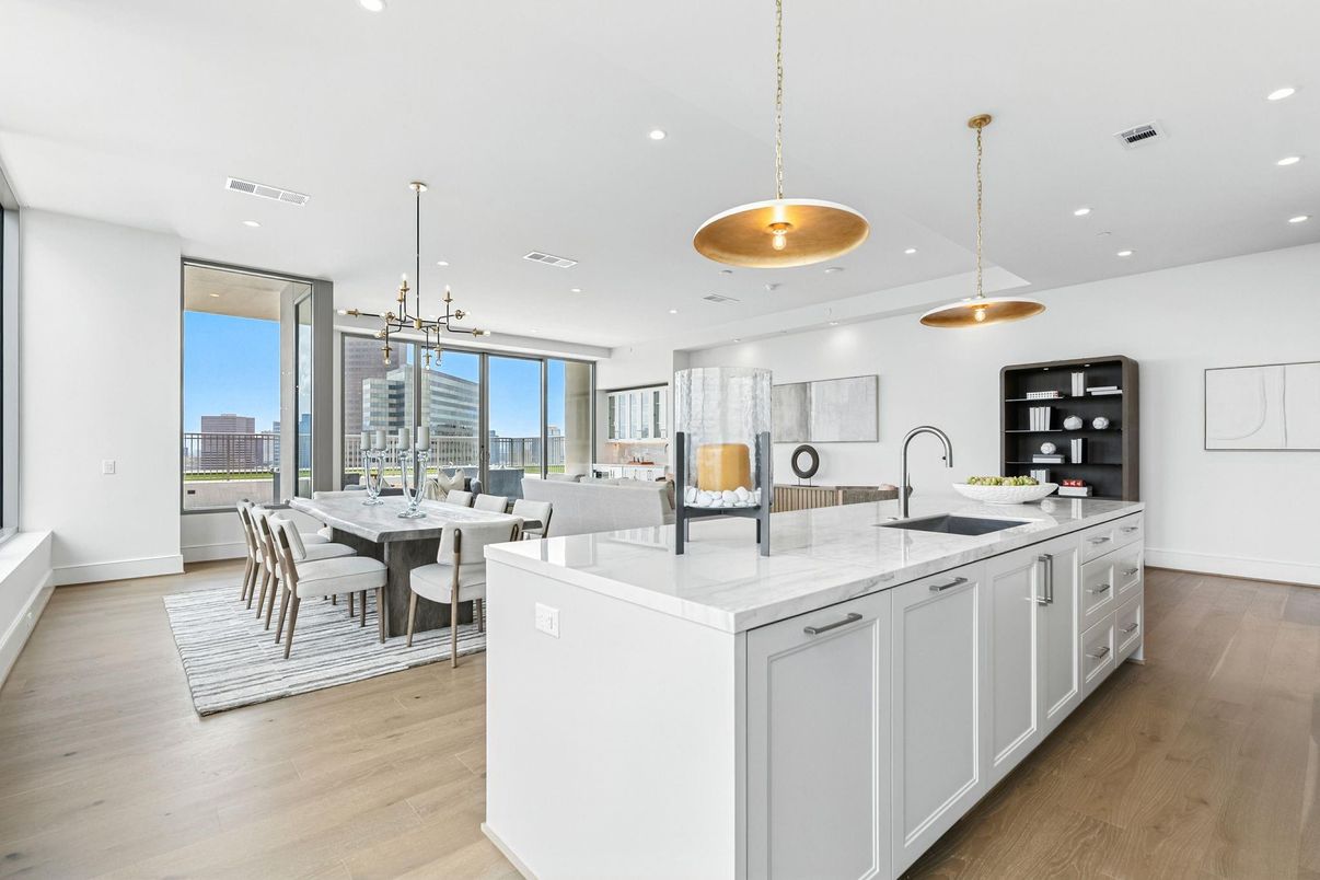 Dining room, Interior, Kitchen, Pendant Lights, Recessed Lighting, Stainless Steel Appliances, Wood Texture Flooring