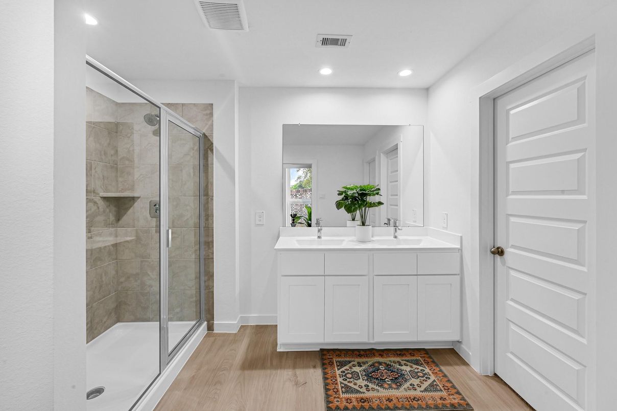 Bathroom, Dual Sink Vanities, Glass Shower, Interior, Recessed Lighting, Wood Texture Flooring