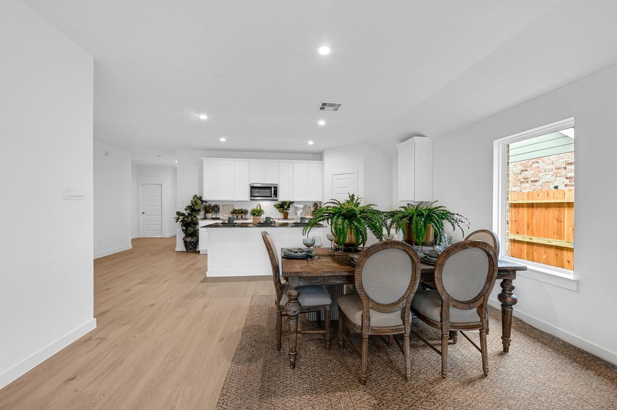 Dining room, Interior, Kitchen, Recessed Lighting, Stainless Steel Appliances, Wood Texture Flooring