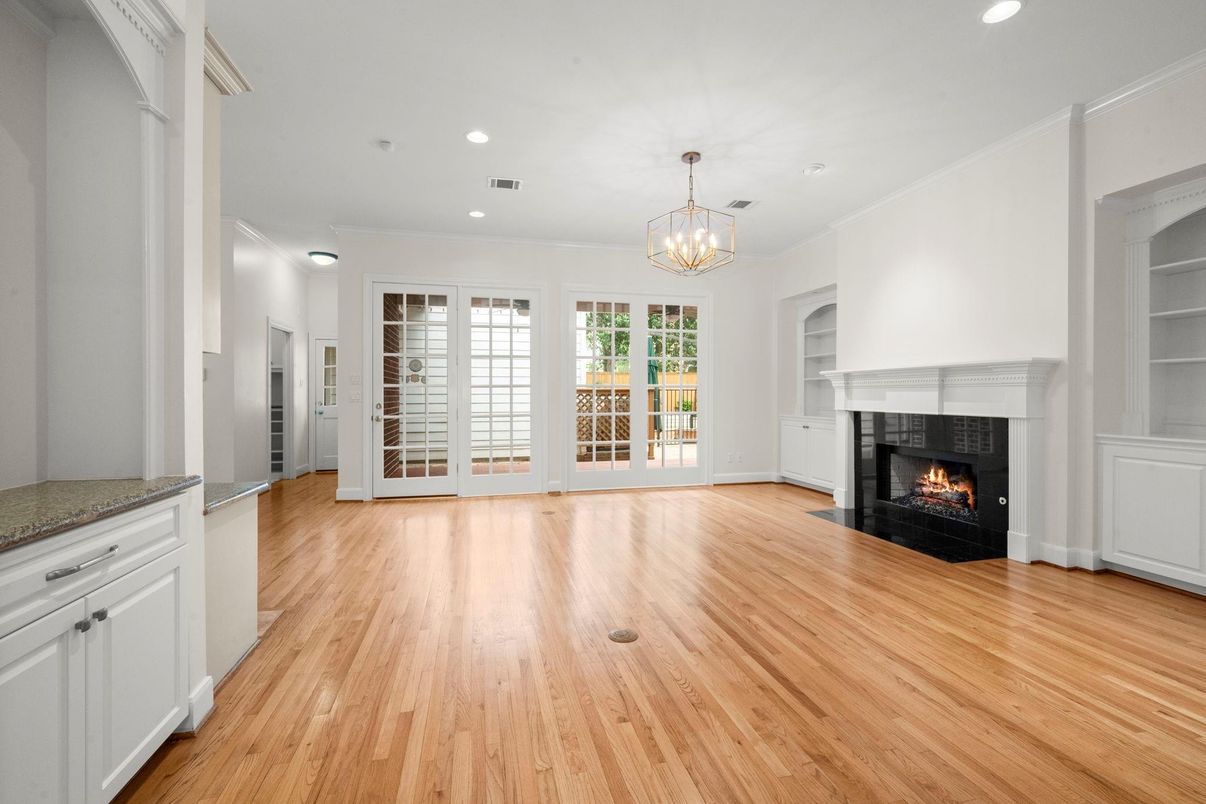 Chandelier, Empty room, Fireplace, Interior, Pendant Lights, Recessed Lighting, Wood Texture Flooring