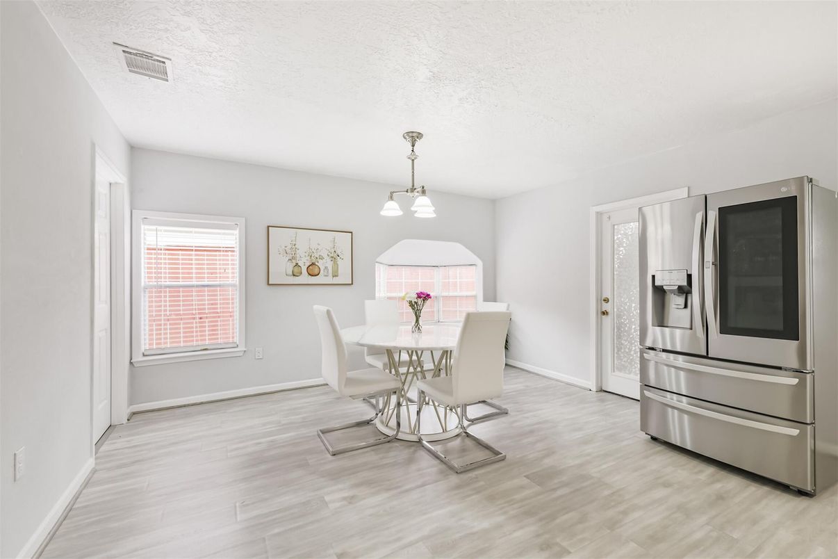 Dining room, Interior, Kitchen, Pendant Lights, Stainless Steel Appliances, Wood Texture Flooring