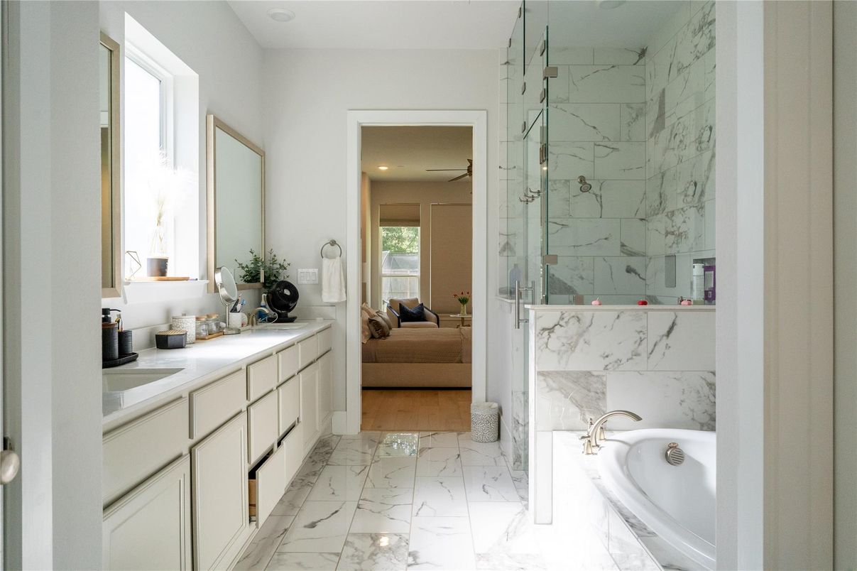 Bathroom, Dual Sink Vanities, Glass Shower, Interior, Marble, Marble Walls, Recessed Lighting