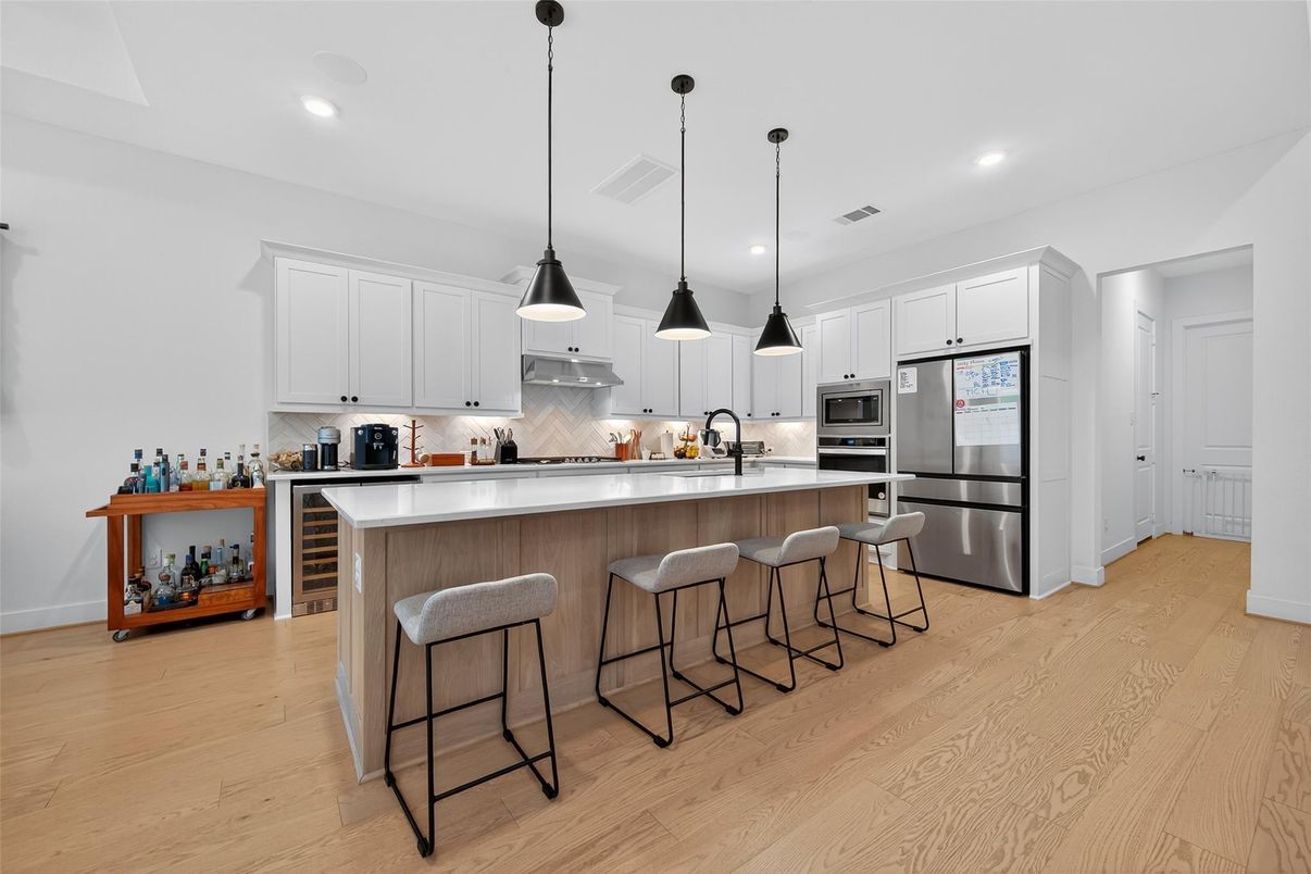 Interior, Kitchen, Pendant Lights, Recessed Lighting, Stainless Steel Appliances, Wood Texture Flooring