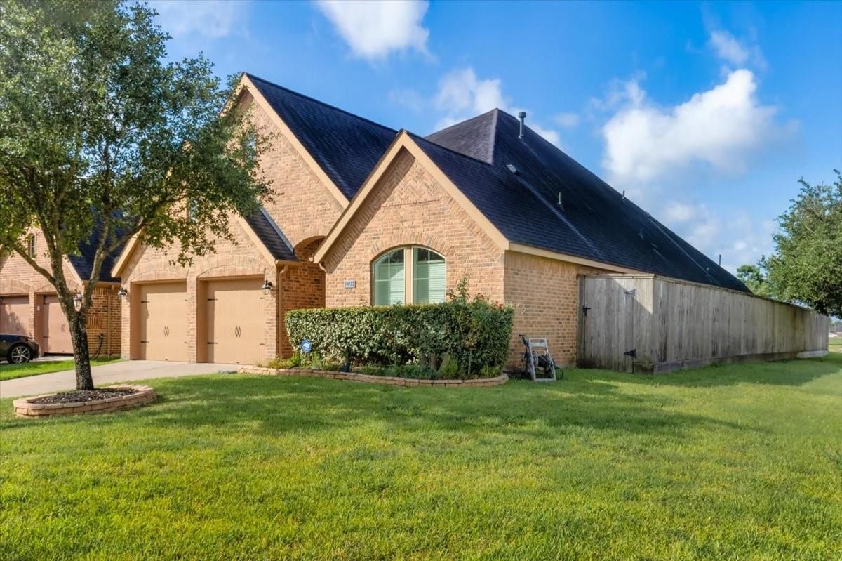 Attached, Backyard, Exterior, Facade, Brick Facade, Brick Traditional