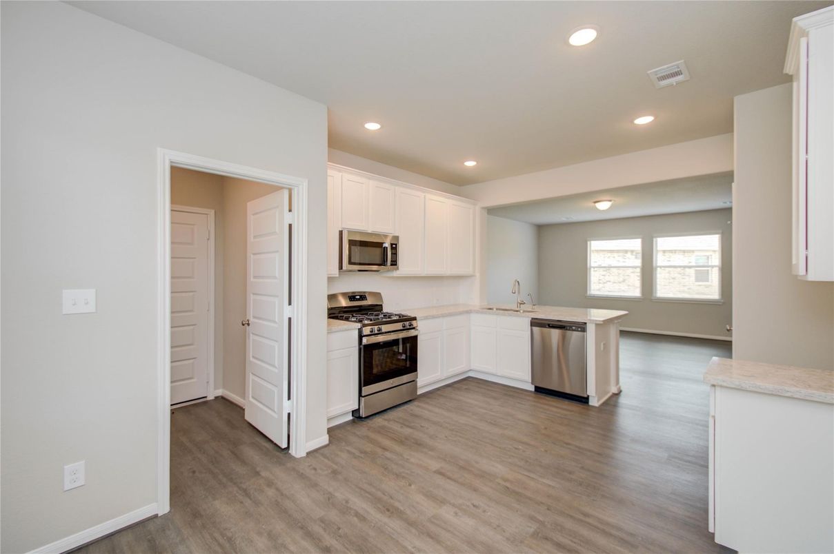 Interior, Kitchen, Recessed Lighting, Stainless Steel Appliances, Wood Texture Flooring