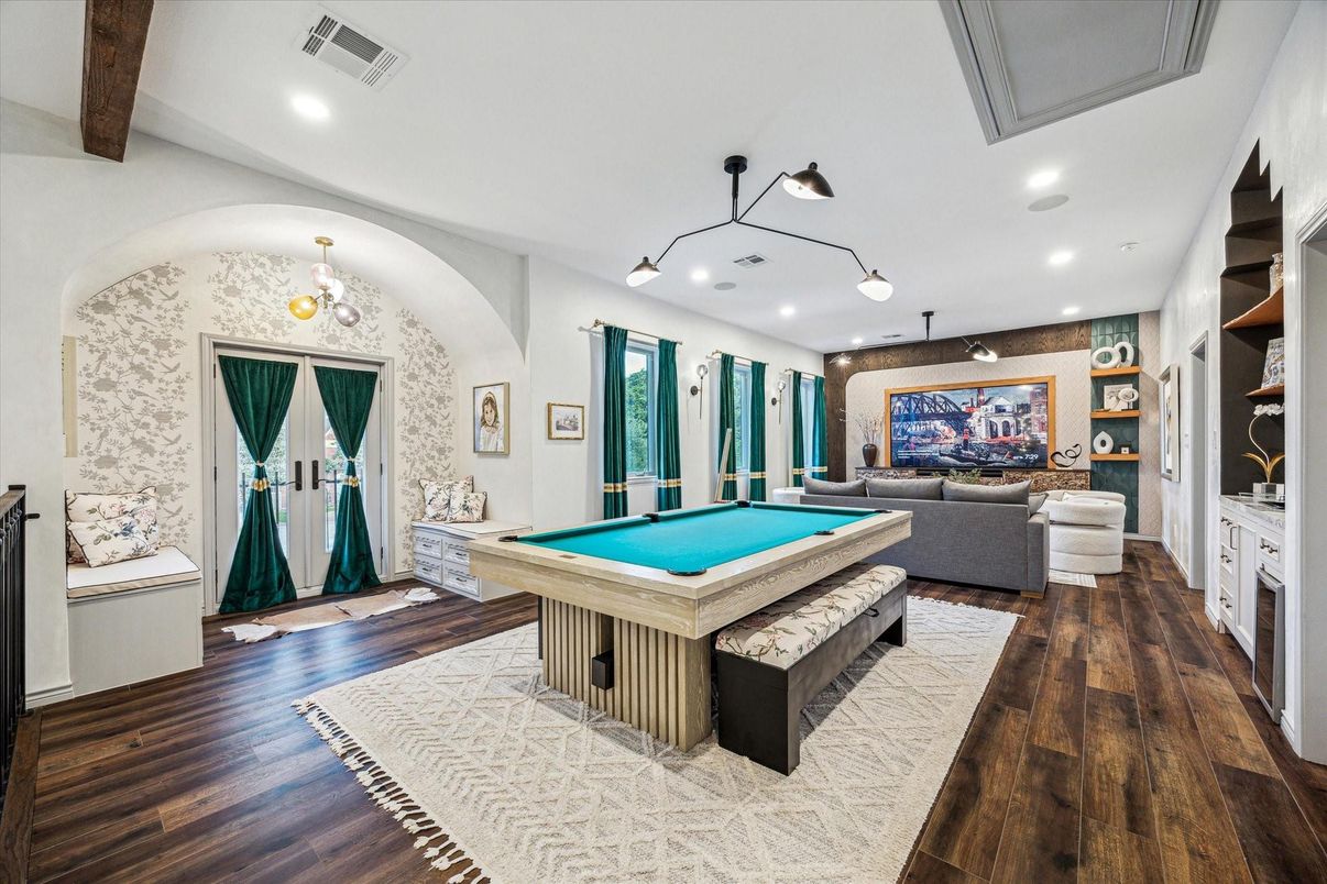 Billiard Table, Fireplace, Game Room, Interior, Living room, Pendant Lights, Recessed Lighting, Wood Texture Flooring